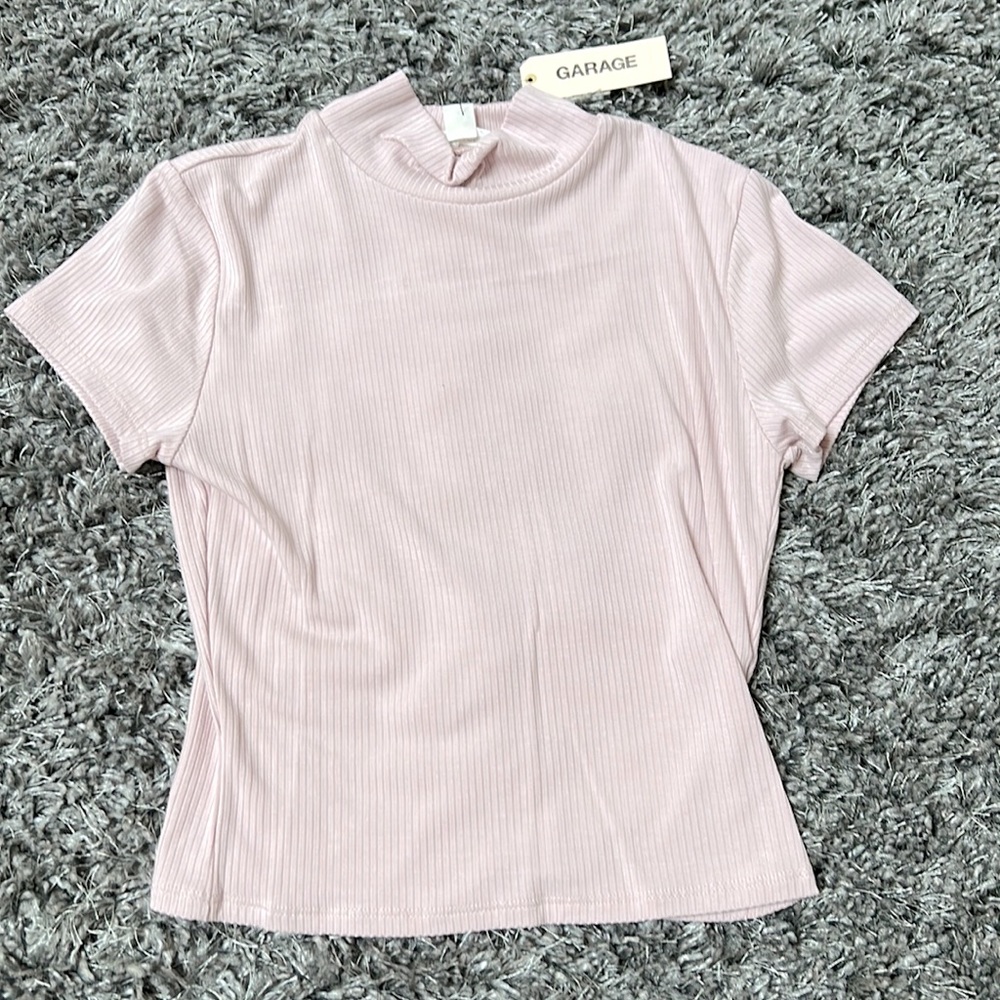 Tight cropped light pink shirt sleeve turtle neck